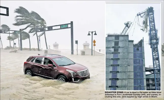  ??  ?? DISASTER ZONE: A car is dead in the water as trees blow sideways in Fort Lauderdale Sunday (left), and cranes, including this one, were toppled by high winds in Miami.