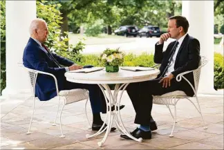  ?? Evan Vucci / Associated Press file photo ?? President Joe Biden meets with Sen. Chris Murphy, D-Conn., about gun control outside the Oval Office of the White House on June 7. Murphy has been the Senate’s leading advocate for stronger gun control since the massacre of 20 children at a school in Newtown in 2012. “There has been a thirst from voters, especially swing voters, young voters, parents, to hear candidates talk about gun violence, and I think Democrats are finally sort of catching up with where the public has been,” said Murphy.