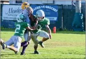  ?? JOSE QUEZADA — FOR THE TIMES-STANDARD ?? Brothers Grant (2) and Will Omey combine for a tackle.