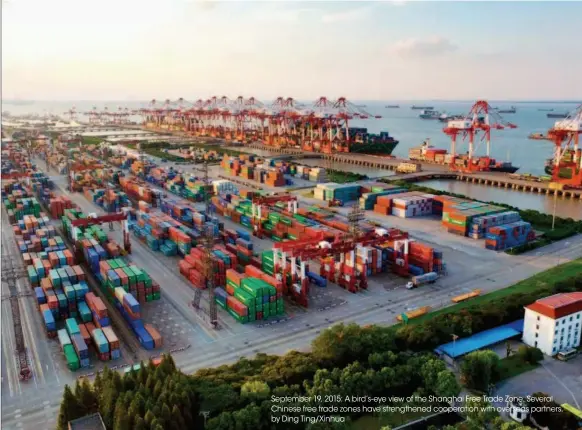  ??  ?? September 19, 2015: A bird’s- eye view of the Shanghai Free Trade Zone. Several Chinese free trade zones have strengthen­ed cooperatio­n with overseas partners. by Ding Ting/xinhua