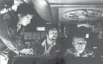  ?? 20th Century Fox ?? PROLIFIC ACTOR John Hurt, left, appears in the 1979 film “Alien” with Tom Skerritt and Ian Holm. Hurt, whose career spanned more than 50 years, was twice nominated for an Oscar, for playing the tortured John Merrick in David Lynch’s “The Elephant Man”...