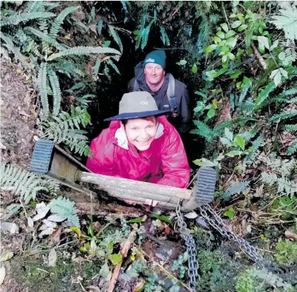  ?? Photo / Supplied ?? Cherry Channon (front) and Charlie Bilby emerge from a vertical shaft to a platinum mine on the Sledge Track.
