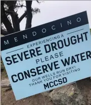  ?? The Associated Press ?? Signs alert visitors to the severe drought in Mendocino, Calif., on Aug. 4. Tourists will also find public portable toilets and dozens of signs on picket fences announcing the quaint Northern California hamlet: “Severe Drought Please conserve water.”