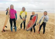  ??  ?? GIRL POWER: The girls/ladies top four in the Easter Surf Classic last weekend, from left, are Chelsea Klotz and Kaylee Shaw Nel from Jeffreys Bay, local Lily Heny (the winner) and Chelsea Beaton from Cape Town