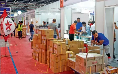  ?? — Photos by Shihab ?? CALM BEFORE THE (TECH) STORM: Gitex Shopper preparatio­ns in full swing at the Dubai World Trade Centre on Friday.