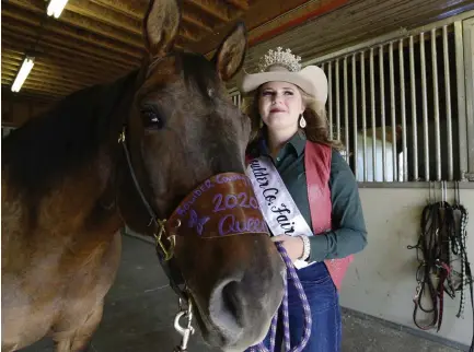  ?? Photos by Cliff Grassmick, Daily Camera ?? Amber Nusser, 2020 Boulder County Fair Queen, will not have the same routine as prior queens. The 17-year-old from Niwot had been hoping to show off her riding skills with her horse, Miley.