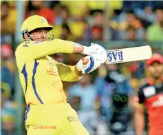  ??  ?? Chennai Super Kings captain and batsman M.S. Dhoni hit 84 as his side lost by one run on the final ball against Royal Challenger­s Bangalore. - AFP photo