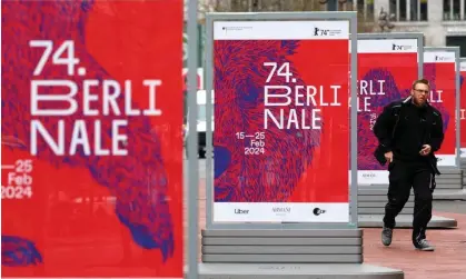  ?? ?? Advertisin­g billboards for the upcoming 74th Berlin internatio­nal film festival. Photograph: Fabrizio Bensch/Reuters