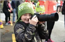  ??  ?? Caught on camera....8 year old Darragh Grayson from Glenbeigh getting the action on the start line at the 30th Curlews O’Shea Cup Run in Beaufort on New Year’s Day.