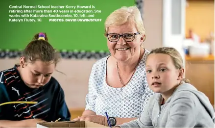  ?? PHOTOS: DAVID UNWIN/STUFF ?? Central Normal School teacher Kerry Howard is retiring after more than 40 years in education. She works with Kataraina Southcombe, 10, left, and Katelyn Flutey, 10.