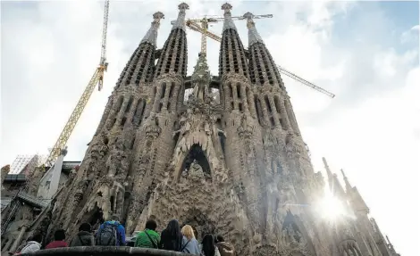  ?? DAVID RAMOS/GETTY IMAGES ?? Barcelona’s Sagrada Familia is a top tourism attraction in Spain, which ranks high for its natural and cultural resources.