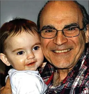  ??  ?? So close: David Suchet with his grandson Todd, who has a rare genetic illness