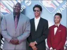  ?? PHOTO BY RICHARD SHOTWELL — INVISION — AP ?? Shaquille O’Neal, from left, and his sons Shareef O’Neal and Shaqir O’Neal arrive at the NBA Awards on Monday at the Barker Hangar in Santa Monica, Calif.