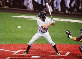 ?? Eddy Matchette / For the Chronicle ?? Langham Creek’s Garrett Lax (23) readies himself to hit during this fourth inning at bat in the Game 2 win over Deer Park last week.