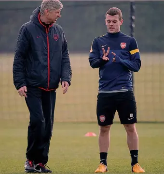  ?? REUTERS ?? Arsene Wenger, 63, tecnico dell’Arsenal, con Jack Wilshere, su cui il francese fa grande affidament­o