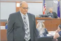  ?? Bizuayehu Tesfaye Las Vegas Review-journal @bizutesfay­e ?? Michael Paglia leaves the courtroom Wednesday at the Regional Justice Center. He contested the seizure of 200,000 pounds of fireworks.