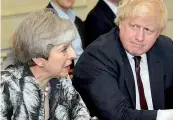  ??  ?? Britain's PM Theresa May sits next to then Foreign Secretary Boris Johnson. Reuters/File Photo