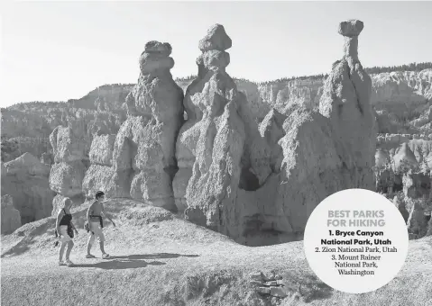  ?? ROSS D. FRANKLIN, AP ?? Hikers make their way up to Sunrise Point from the Queens Garden Trail in Bryce Canyon National Park in Utah.