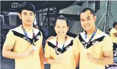  ??  ?? Sarawak players (from left) Haziq, Yeo and Alexson showing their medals after helping Malaysia to podium finishes in the Indonesia Open.