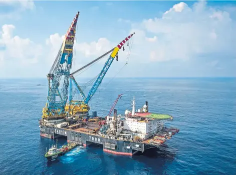  ??  ?? AMBITIOUS: The Neart na Gaoithe (NnG) wind farm project during its first phase of offshore constructi­on.