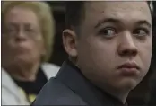  ?? MARK HERTZBERG — POOL PHOTO ?? Kyle Rittenhous­e looks to the gallery during his trial at the Kenosha County Courthouse in Kenosha, Wis., on Tuesday.