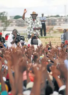  ?? /File Picture ?? Champion of the people: MDC leader Morgan Tsvangirai is cheered as he addresses his supporters in Chitungwiz­a near Harare. The ailing Zimbabwe. opposition leader died at the age of 65 on Wednesday.