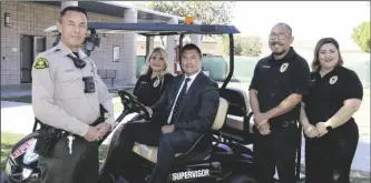  ?? ?? New Risk, Security and Safety Manager, Edgar Quiñones (seated in cart) is joined by IVC Campus Safety Team members (from left) IVC School Resource Officer Deputy Carlos Esquer, Campus Safety Coordinato­r Gina Madrid, Campus Safety Specialist Ivan Guillen and Campus Safety Specialist Luz Ayon.