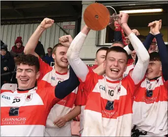  ??  ?? Charlevill­e team captain Cathal Carroll thrilled to raise the County U-21 ‘B’ Football Championsh­ip Cup at Pairc Uí Rinn. Photo by John Tarrant