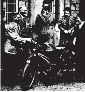 ??  ?? The presentati­on of the auto-cycle to nurse Glover with Colonel and Mrs F. F. Burghard who were accompanie­d by Mr A. Jones and Mr H. Ward of the fund-raising committee.
(Right) The blitz continued across Britain, this picture shows an attack of Old Street, Plymouth.