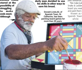  ??  ?? Donald Lindo,82, of Spanish Town, St Catherine, has been painting board games for more than 20 years.