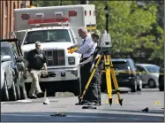  ?? AP/MEL EVANS ?? Investigat­ors work Sunday at the scene of a shooting at an arts and music festival in Trenton, N.J.