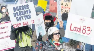  ?? TONY CALDWELL • POSTMEDIA NEWS ?? Nurses protest Bill 124, which limits public sector wage increases in Ontario to one per cent annually, on March 4.