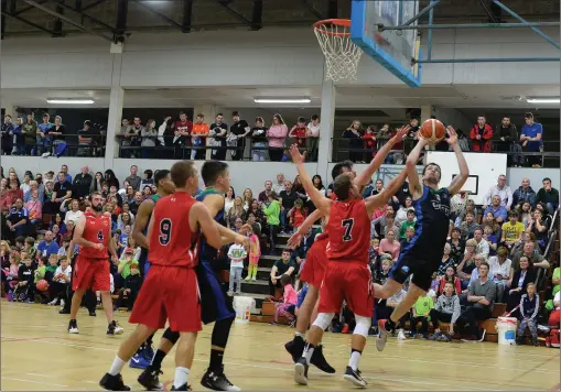  ??  ?? Action from the Superleagu­e game between Tralee Warriors (black) and KUBS Dublin played at a packed Tralee Sports Complex on Saturday. Photo by Domnick Walsh