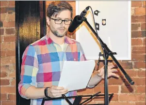  ?? MAUREEN COULTER/THE GUARDIAN ?? Keith Burgoyne of Charlottet­own reads Chapter 3 of his book as part of the Writer’s Guild open mic at Receiver Coffee on Oct. 12. His book, which currently does not have a title, is about an elderly man who has chronic depression and is writing a...