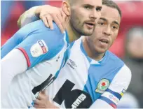  ??  ?? BRAD COMPANY Blackburn’s Bradley Johnson celebrates with Elliott Bennett after scoring his side’s second goal