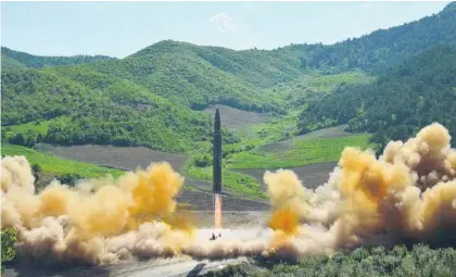  ?? Picture / AP ?? North Korea says it has undertaken its first successful interconti­nental ballistic missile test.