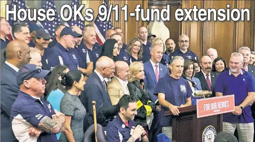  ??  ?? ‘LET THEM EXHALE’: Comedian Jon Stewart speaks at the Capitol ahead of Friday’s vote while joined by Speaker Nancy Pelosi and New York Reps. Max Rose, Carolyn Maloney, Sean Maloney, Grace Meng and Peter King, as well as 9/11 responders John Feal (far left in cap) and Rob Serra (in wheelchair) and 9/11 family member Phil Alvarez (far right in blue) and fire-officers union head Jake Lemonda (at Pelosi’s left).