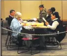  ?? Ned Gerard / Hearst Connecticu­t Media file photo ?? Registrars count absentee ballots on election night at the Morton Government Center in Bridgeport in 2018.