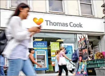  ?? TOLGA AKMEN/AFP ?? British travel agent Thomas Cook went bankrupt overnight last month.