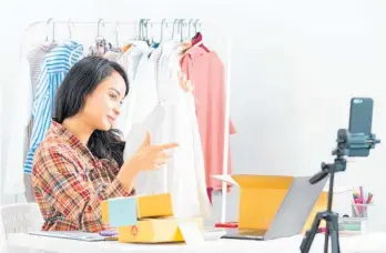  ?? Photo / Getty Images ?? Influencer­s face the task of working out the resale value of items they receive.
