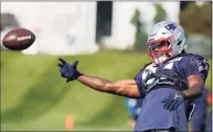  ?? Steven Senne / Associated Press ?? New England Patriots outside linebacker Dont'a Hightower tosses the ball during practice on Wednesday in Foxborough, Mass.