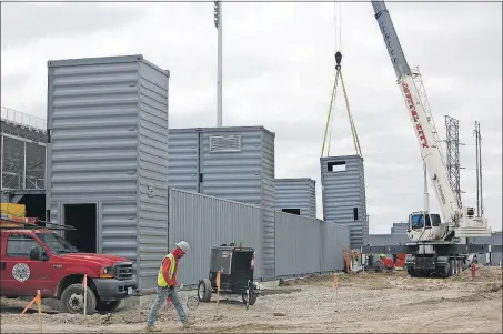  ?? [PHOTOS BY JOSHUA A. BICKEL/DISPATCH] ?? Though the Machine will play its home opener tonight, its new stadium, Fortress Field in Obetz, is still a work in progress that will come to completion over the course of the season.