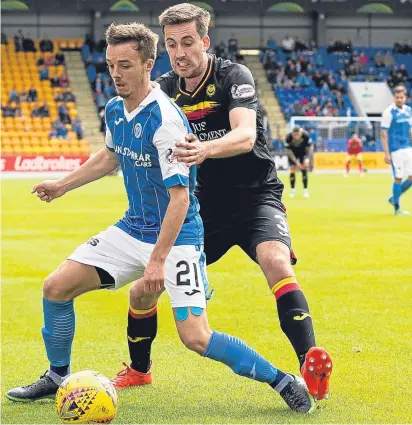  ?? SNS. ?? Left: Michael O’Halloran scores the only goal of the game after being sent through by a pass from captain Steven Anderson; above: Stefan Scougall holds off Partick Thistle’s Callum Booth.