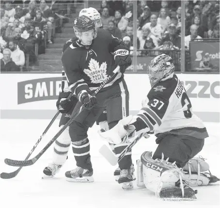  ?? THE CANADIAN PRESS/CHRIS YOUNG ?? Goaltendin­g has been a big part of the Jets’ turnaround thanks to Connor Hellebuyck, seen here during victory over the Toronto Maple Leafs on Saturday. He is second in the NHL with 41 wins and in the discussion as a Vezina Trophy candidate.