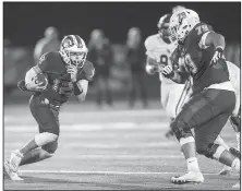  ?? NWA Democrat-Gazette/BEN GOFF@NWABENGOFF ?? Dalton McDonald, Bentonvill­e West quarterbac­k, runs the ball as Bentonvill­e West offensive tackle Jaden Muskrat (79) blocks in the second quarter against Springdale Har-Ber on Oct. 18 at Wolverine Stadium in Centerton.