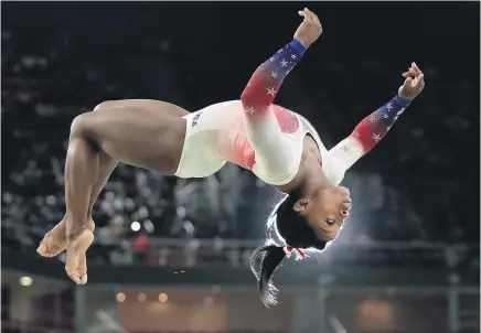  ?? Picture / AP keep them interested. Ditto. ?? Simone Biles exemplifie­s gymnastics, the best of Olympic sports. There are many other sports which struggle to justify their inclusion. Synchronis­ed swimming Badminton Rowing Judo Wrestling Water polo Boxing Football Golf