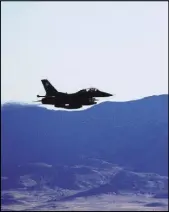  ?? John Salois The Associated Press ?? An F-16C makes a pass over Nevada’s Tonopah Test Range after a March test of a mock nuclear weapon as part of a life extension program for the B61-12.