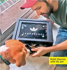  ??  ?? Rohit Sharma with his pet