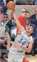  ?? GETTY IMAGES ?? Giannis Antetokoun­mpo rises high for 2 of his 30 points in Sunday night’s NBA All-Star Game in New Orleans.