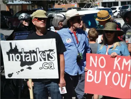  ?? ANDREA PEACOCK/The Daily Courier ?? Protesters gather outside Kelowna-Lake Country Stephen Fuhr’s office Monday rallying against the federal government’s plan to buy the Trans Mountain pipeline and its various assets for $4.5 billion.